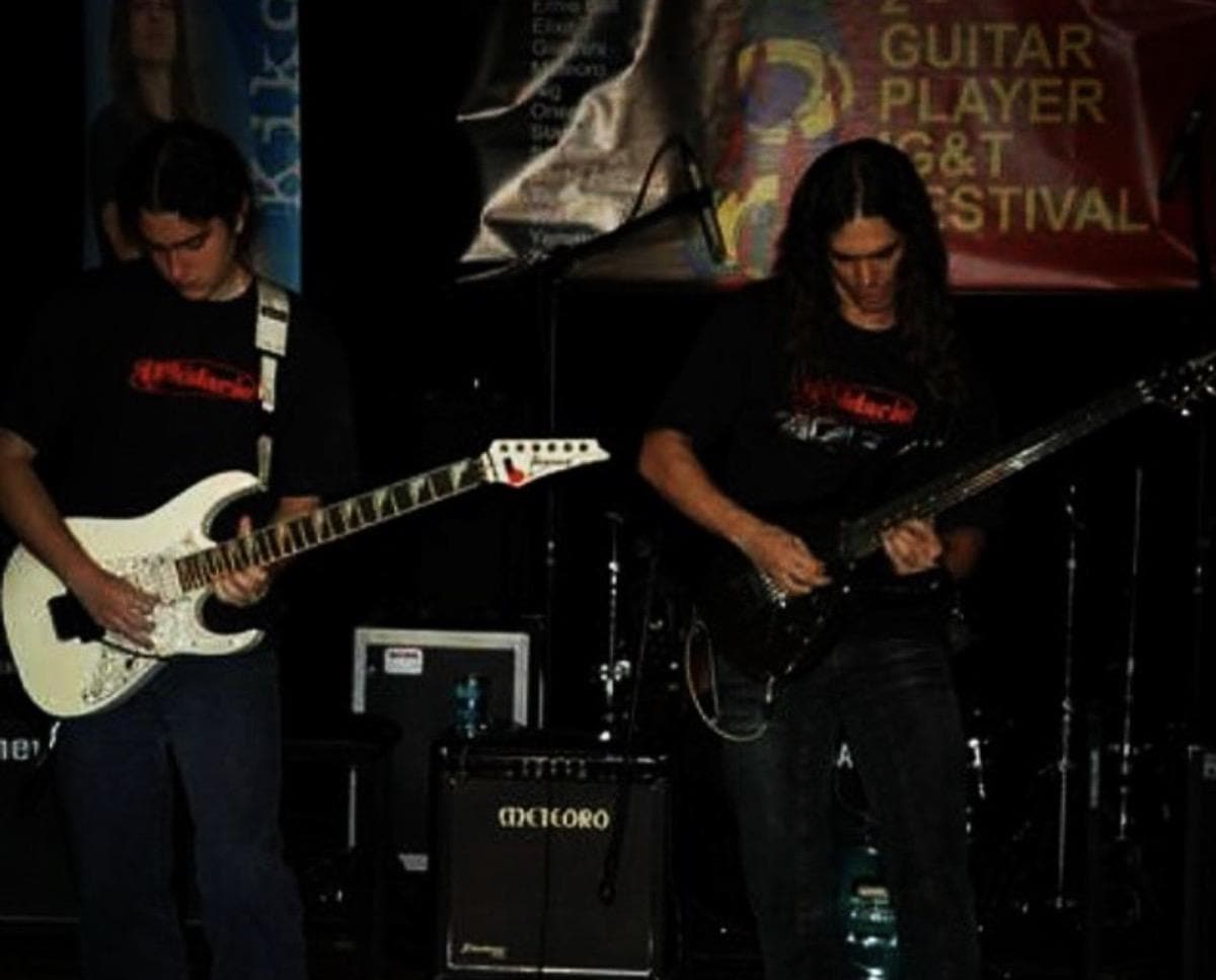 Kiko Loureiro and young João Milliet playing at Guitar Player Magazine Festival